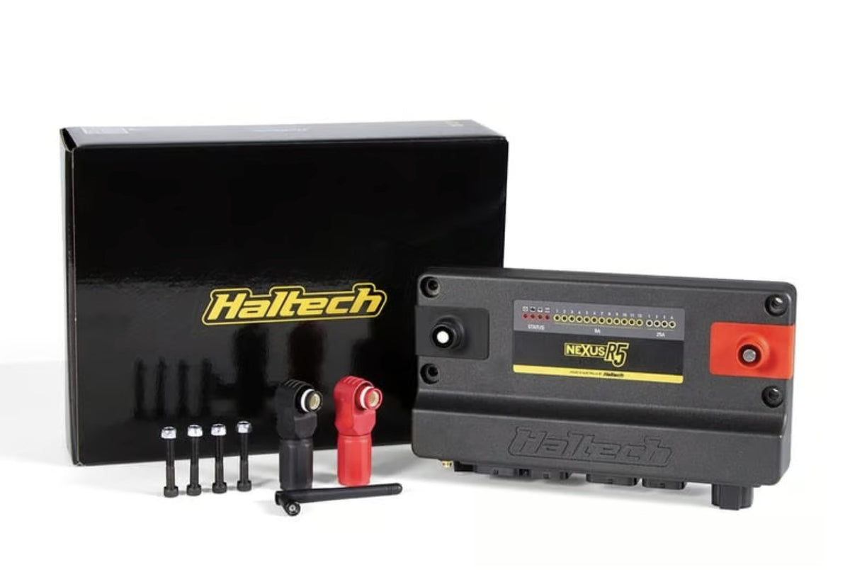 Haltech Nexus R5 VCU with its box, SurLok battery terminals, Wi-Fi antenna and mounting bolts.